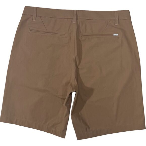 Vuori Meta Short Men's 34 Tobacco Brown Performance Chino 100% Polyester Stretch - Picture 2 of 4